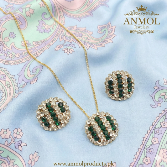 Jewelry set with necklace and earrings on a decorative fabric background, featuring the brand 'Anmol Jewelry'.